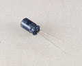 RE-25V1O1MMA 100.0000uf 25.0V capacitor.