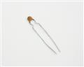 DD104-989B101K50 100.0000pf 50.0V capacitor.